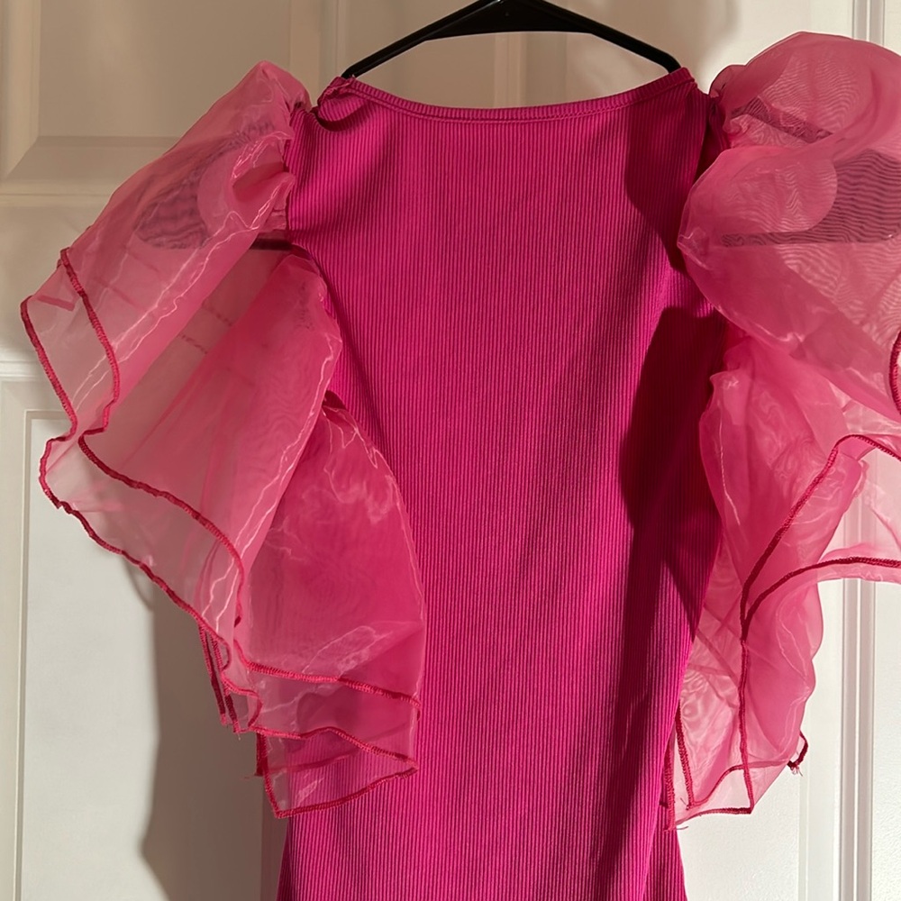 Pink bodysuit with tulle sleeves